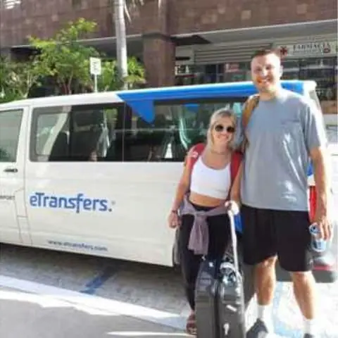 Ethan S. with the eTransfers van at the airport